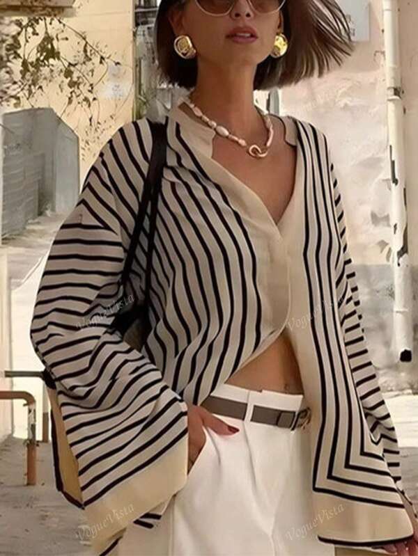 Blusa holgada y fluida con rayas y botones ocultos para mujer