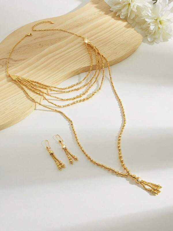Yiyi Dubai-Inspired Minimalist, Sweet, Exaggerated, Gold-Colored Copper Fashionable And High-End Luxury Retro Big Bling Jewelry Set For Women, Suitable For Outings, Leisure, Parties, Daily Dates, Christmas, And Other Holidays. It Includes A Layered Gold-Plated Long Bling Necklace And Layer Tassel Earrings As A Gift For Women, Girlfriends, Parents, Etc