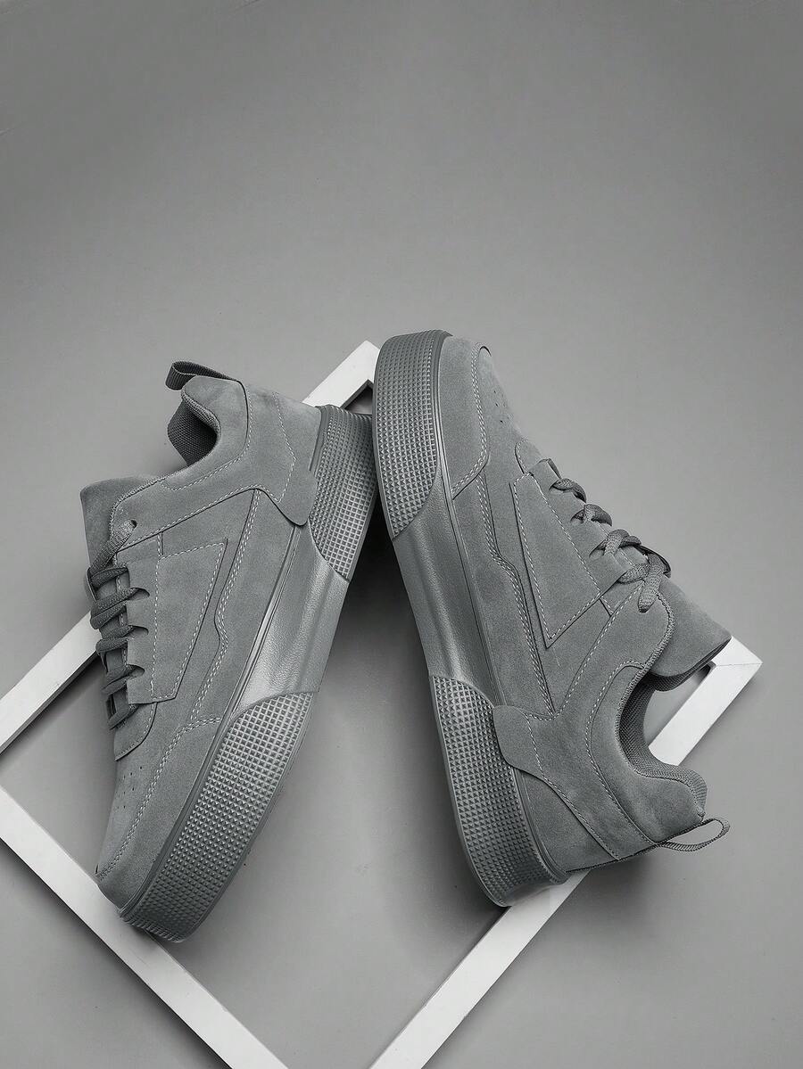 Zapatillas deportivas casuales de hombre de alta calidad con cordones, puntera redonda y combinación de gris sólido, versátiles para uso diario y deportivo, ideales para combinar con vaqueros