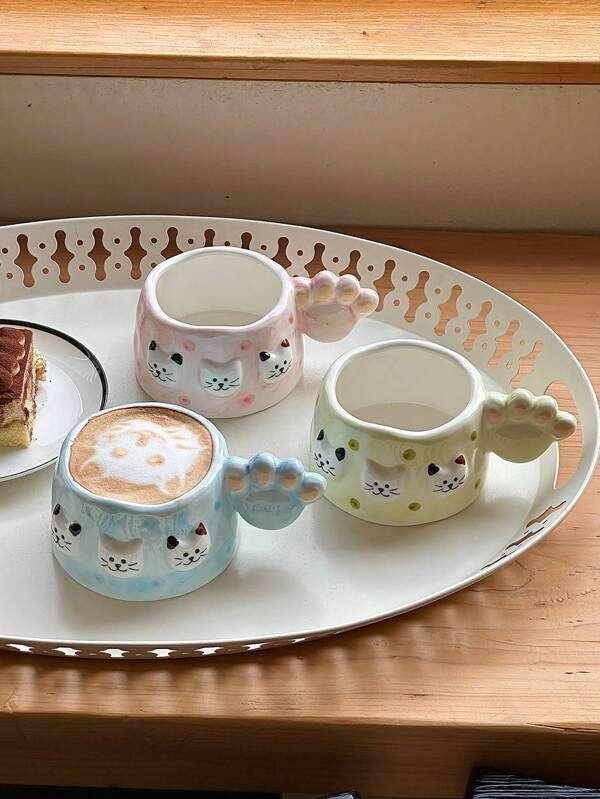 1 pieza Taza de café de cerámica casera creativa y linda con asa en forma de pata de gato y cara de gato pintada a mano