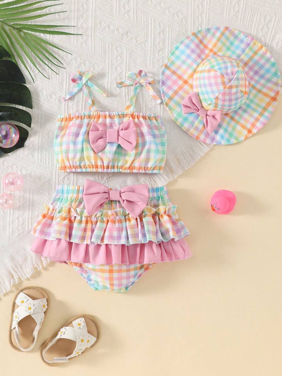 Bộ 3 món/Bộ đồ bơi cho bé gái gồm áo dây mảnh trang trí nơ 3D nhiều màu + váy xếp ly đôi + mũ - Nhiều màu - Xem 1