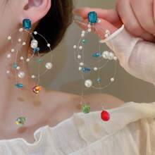 Boucles d'oreilles pendantes minimalistes à pampilles colorées en forme d'étoile, à la mode et polyvalentes pour femmes