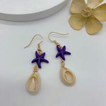 1 paire de boucles d'oreilles avec pendentif étoile de mer et coquillage, simples et à la mode dans un style plage. Convient pour un port quotidien, les vacances et en tant que cadeau pour les femmes