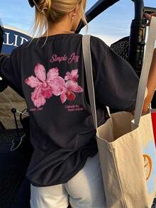PLAYERA DE DAMA CON ESTAMPADO DE AZUCENA SIMPLE JOY TRASERA PARA GYM O CASUAL - Negro - Ver 1