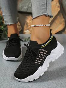 女士黑色针织一脚蹬运动鞋：透气时尚，镂空设计，完美契合全天舒适穿着，轻松打造时尚造型