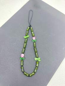 Stilvoller Bambus Tulpe Handyband mit Glasperlen - Traditionelles glückliches Accessoire mit grünen Perlen und Blumendekoration