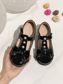 甜美可爱的蝴蝶结珍珠装饰平底休闲鞋，适合学生