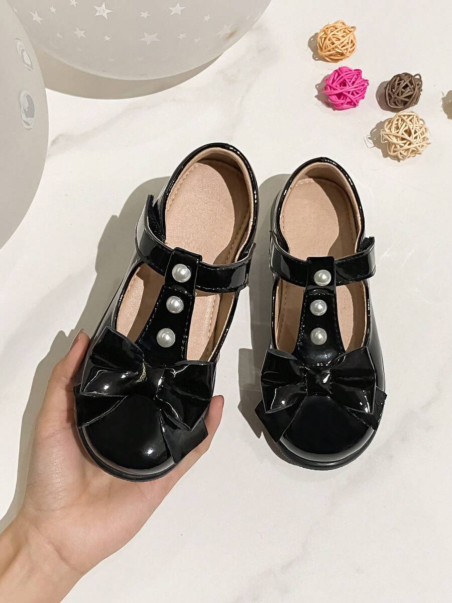 甜美可爱的蝴蝶结珍珠装饰平底休闲鞋，适合学生