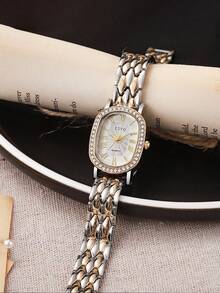 1pc Minimalist Oval Shape Fashionable Roman Numeral Dial Exquisite Steel Band Quartz Watch, Suitable For Teenage, Ideal For Birthday, Graduation Gift