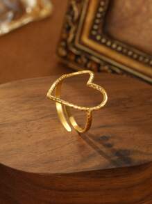 1 pièce Bague pour femme en acier inoxydable plaqué or 18 carats, style minimaliste, avec un seul cœur ajouré, et de luxe léger