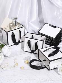 20 个迷你白色黑色边框礼品袋，带手柄 - 工匠、派对策划者、送礼者，非常适合婚礼、生日、派对、工艺品、送礼和珠宝收纳 - 粉色牛皮纸（7X5.9X2.75 英寸）中小型派对礼品袋 - 白色黑色邊框 - 查看 6