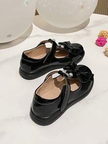 甜美可爱的蝴蝶结珍珠装饰平底休闲鞋，适合学生