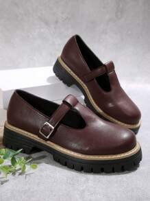Chaussures plates à semelle épaisse, tout-aller, en PU, avec une bride en T et une boucle. Convient pour le port en extérieur au printemps, en été et en automne.