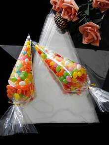 50/100 uds Bolsas cónicas de golosinas, bolsas de palomitas, bolsas de celofán triangulares con lazos retorcidos para caramelos, galletas hechas a mano, regalos de boda, cumpleaños, día de San Valentín, suministros para bufé de dulces y Navidad - transparente - Ver 8
