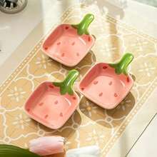 Set di 2 piatti in ceramica con manico a forma di fragola, lunghezza 12,5 cm, piatti di fragole carini per patatine e salse, stuzzichini e taglieri di formaggio, perfetti per snack, verdure, frutta, burro, salsa di soia, salse da intingere. Questi piccoli piatti in ceramica sono ideali per l'uso domestico come piatti per intingere, piatti per salse o piccoli piatti per la tavola quotidiana. Ideali per salse da intingere, patatine, frutta, insalate e piccole porzioni.
