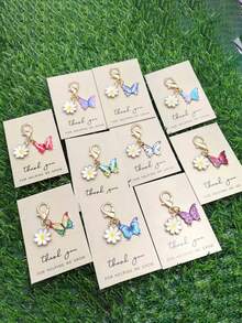 12件套可爱迷你彩色蝴蝶雏菊钥匙扣套装，适合用作包包挂件、包链、包包装饰，时尚动物主题设计，完美适用于包包挂饰、钥匙扣、车钥匙扣，是节日、母亲节、父亲节、返校季、毕业季的理想礼物。 - 彩色 - 查看 10