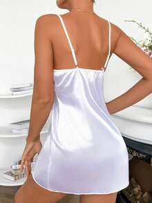 Áo ngủ hai dây gợi cảm mới, đồ ngủ satin trắng sang trọng xẻ cao, váy ngủ ngắn phối ren và nơ thời trang, thích hợp cho các buổi tiệc khiêu vũ, đi chơi và các dịp khác. - trắng - Xem 2