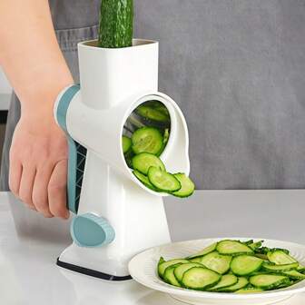 Rallador rotativo multifuncional para verduras y queso, con base de ventosa resistente para estabilidad, incluye caja de almacenamiento adicional para cuchillas para una organización cómoda en la cocina