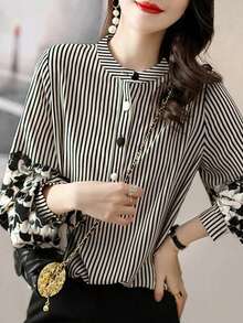 Elegancka damska koszula w paski z kwiatowym wzorem i rękawami typu "latarnia" – okrągły dekolt, długie rękawy, zdobienie guzikami, wygodna góra z poliestru, odpowiednia na każdą porę roku