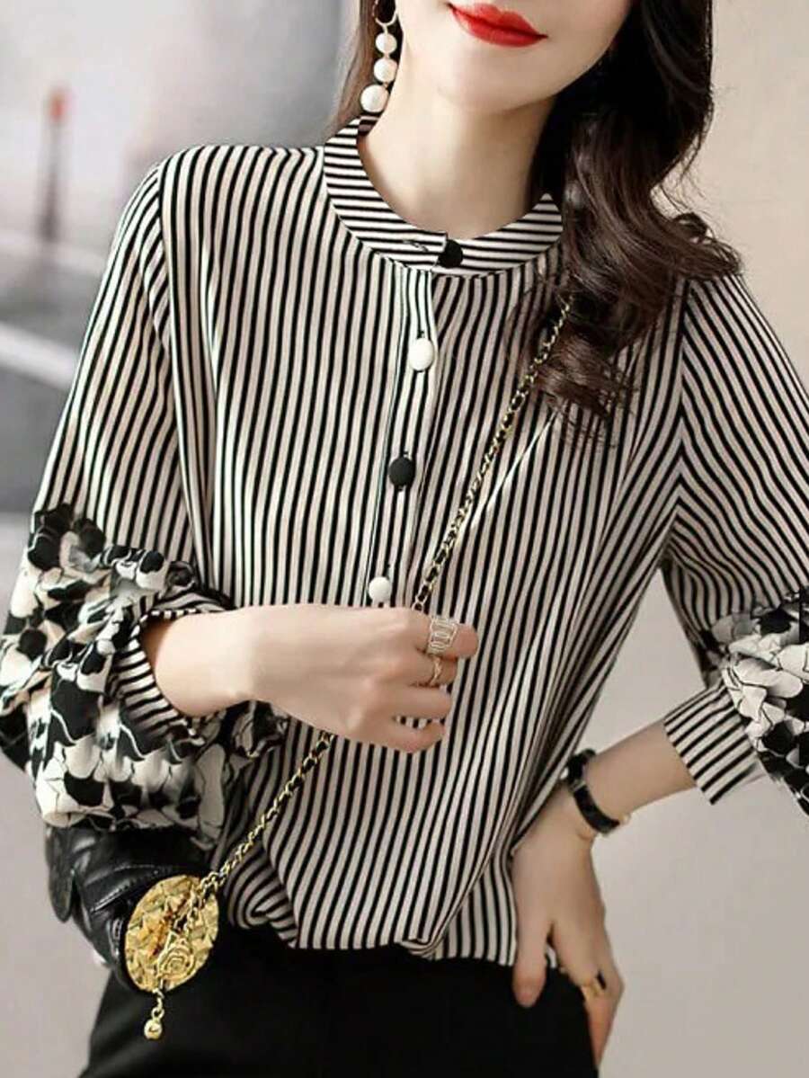 Elegancka damska koszula w paski z kwiatowym wzorem i rękawami typu "latarnia" – okrągły dekolt, długie rękawy, zdobienie guzikami, wygodna góra z poliestru, odpowiednia na każdą porę roku