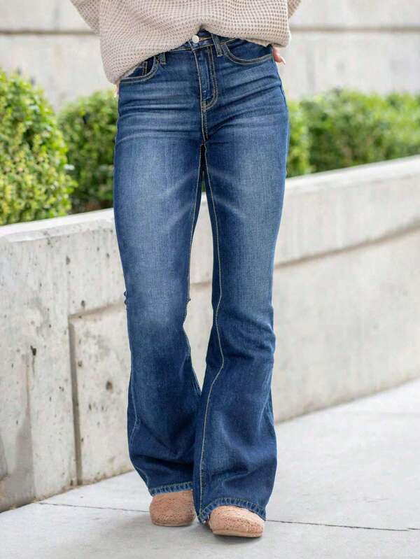 Jeans a zampa d'elefante stretti, semplici e casual, con tasche, in denim elastico e versatile per le donne