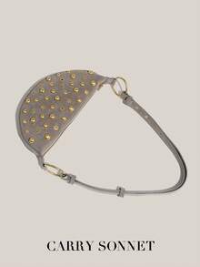 新月形镂空皮革斜挎包，简约设计，适合购物和通勤，是时尚达人日常出行的个性化之选，也是教师节、节日和旅行的理想礼物。 - 灰色 - 查看 4