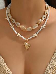 1 件优雅时尚女士夏季海洋元素波西米亚珠宝项链，金海星，小鱼，贝壳，海螺，人造珍珠镶嵌，天然贝壳 DIY 串珠，红珊瑚，树脂吊坠，陶瓷彩绘小鱼，精致多层女士项链，适合海滩、派对佩戴。 - 彩色 - 查看 11