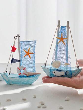 1 pièce Ornements de style océanique avec étoile de mer, coquillage et voile. Petit modèle créatif de bateau à voile en bois. Petits objets décoratifs en artisanat créatif. Ornements décoratifs de bureau. Décorations pour la maison. Convient à la décoration de la chambre, du bureau et du salon comme cadeaux de fête.