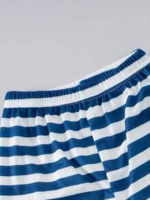 Conjunto de 2 piezas de camiseta de manga corta de cuello redondo y pantalones cortos con estampado de bandera estadounidense, estilo informal para niños