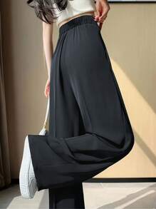 بنطال نسائي عادي أنيق ذو ساق واسعة مستقيمة فضفاض ذو جيوب جانبية منسدلة، مناسب لارتداء مكتبي خلال الربيع أو للمناسبات العادية