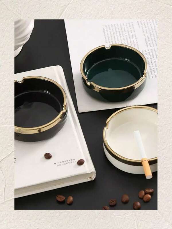 A Multi-Colored Ceramic Piece With Gilded Decoration And Luxurious Ashtray Is An Excellent Home Decor Item.