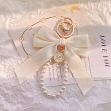 1pc Gorgeous Matte Bowknot Faux Pearl Keychain, Cute Faux Pearl Beaded Bracelet, Vintage Charm, For Women & Girls Wallet, Socks, Backpack, Car Pendant, Ribbon, Pearl Pendant, Valentine's Day, Bowknot Keychain, School Supplies, Teacher Gift, Back To School Teacher Accessory, Valentine's Day Bag Charms Car Accessaries Friend Sister Gift Ideas