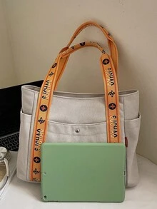 1 件韩版帆布手提包，大容量多口袋设计，时尚简约街头单肩包/腋下包，配有优质肩带