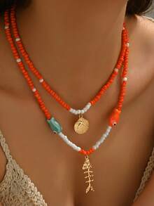 1 件优雅时尚女士夏季海洋元素波西米亚珠宝项链，金海星，小鱼，贝壳，海螺，人造珍珠镶嵌，天然贝壳 DIY 串珠，红珊瑚，树脂吊坠，陶瓷彩绘小鱼，精致多层女士项链，适合海滩、派对佩戴。 - 彩色 - 查看 10