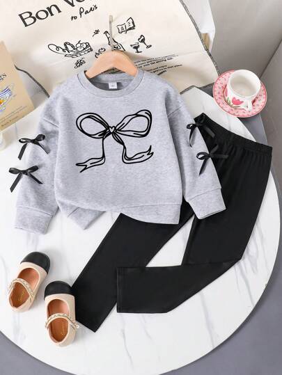 Conjunto de sudadera de cuello redondo cómoda y leggings con decoración de lazo para niña