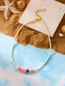 1 pieza Collar único de estilo bohemio con diseño de pez de cerámica, perla blanca y cuentas. Adecuado para uso casual, de playa y de vacaciones para mujeres. Regalo ideal (el color y la cantidad de coral detrás del pez varían al azar, las formas asimétricas de las perlas pueden variar ligeramente debido al lote)