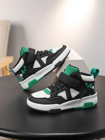 1双儿童男女通用时尚网布皮革拼接厚底中帮休闲运动鞋，四季皆宜