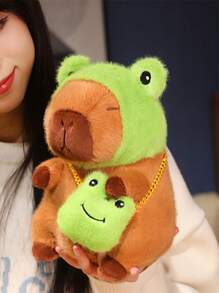 Juguete de peluche adorable de Capibara de 22 cm/8,66 pulgadas con tapa de cabeza de rana y mochila de rana. Estilo de anime de animal de peluche de color marrón oscuro. Regalo perfecto para fans de anime, decoración creativa y regalos para la fiesta de cumpleaños de niños, decoración de habitación de niñas.