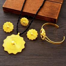 Set de 4 piezas de joyas de mujer de color dorado: collar geométrico poligonal, anillo, aretes y pulsera. Un regalo tradicional africano árabe para la novia.