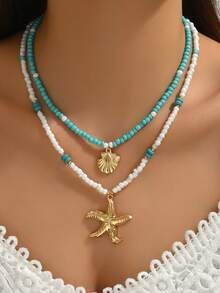 1 件优雅时尚女士夏季海洋元素波西米亚珠宝项链，金海星，小鱼，贝壳，海螺，人造珍珠镶嵌，天然贝壳 DIY 串珠，红珊瑚，树脂吊坠，陶瓷彩绘小鱼，精致多层女士项链，适合海滩、派对佩戴。 - 彩色 - 查看 9