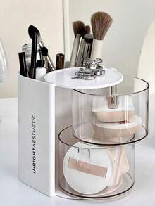 1 pièce Boîte de rangement 2-en-1 pour éponge et houppette de maquillage rotative, organisateur de bureau de coiffeuse élégant et anti-poussière pour éponges de maquillage, coussinets, rouges à lèvres et pinceaux de maquillage. Parfait pour les passionnés de beauté et les professionnels. Cadeau idéal pour les fêtes et les occasions spéciales. Améliorez votre routine de maquillage avec cet organisateur chic et fonctionnel. - Boîte de rangement multicolore - Voir 10