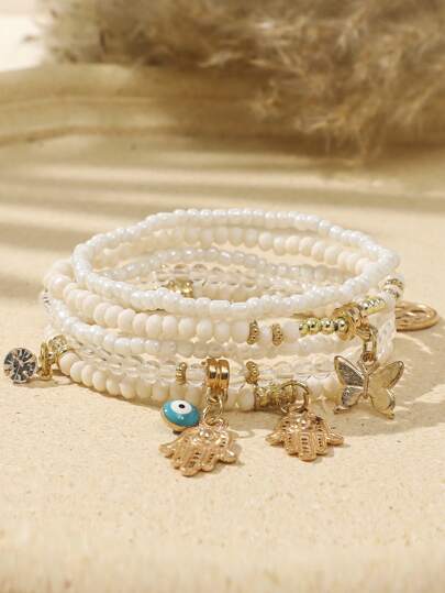 Set de pulseras con cuentas con diseños de ojo del mal, árbol de la vida, borla, mariposa y hoja de palma en estilo bohemio de vacaciones, multicapa, perfecto para usar en primavera/verano como accesorio de playa