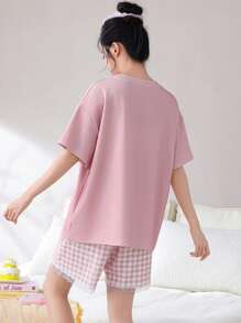 Conjunto de 2 piezas de pijama de estilo mujer con cuello redondo y manga corta - estampado a cuadros, ribete de encaje, diseño lindo de niña de dibujos animados en color rosa