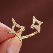 1 pieza Anillo con estrella de cuatro puntas ajustable y circonita cúbica de moda para mujer
