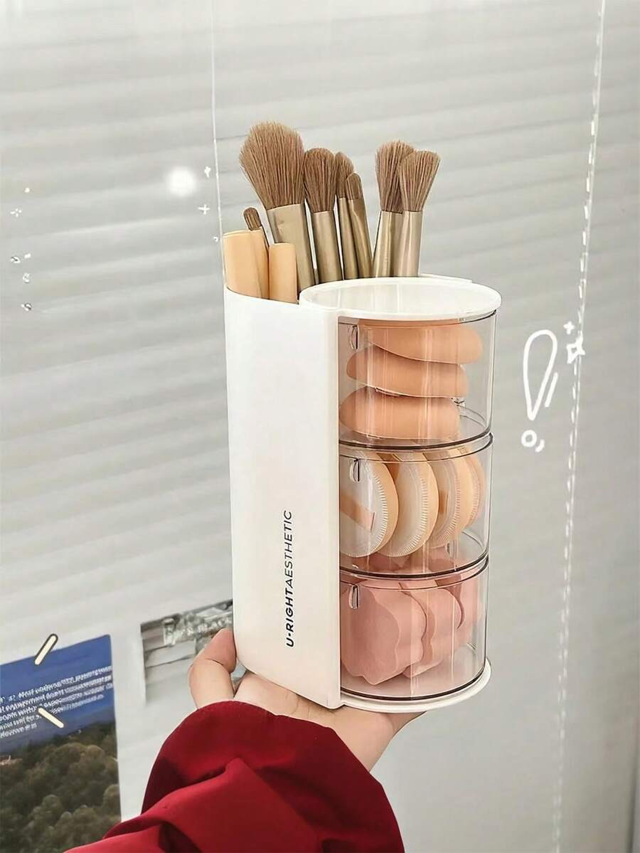 1 pièce Boîte de rangement 2-en-1 pour éponge et houppette de maquillage rotative, organisateur de bureau de coiffeuse élégant et anti-poussière pour éponges de maquillage, coussinets, rouges à lèvres et pinceaux de maquillage. Parfait pour les passionnés de beauté et les professionnels. Cadeau idéal pour les fêtes et les occasions spéciales. Améliorez votre routine de maquillage avec cet organisateur chic et fonctionnel. - Boîte de rangement multicolore - Voir 1