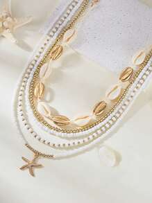 Set de 5 collares con colgantes de estrella de mar y conchas hechos a mano con estilo bohemio y capas para mujeres, adecuados para vacaciones en la playa, fiestas, fotografía, fiestas en la playa, reuniones junto a la fogata, accesorios de moda
