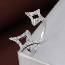 1 pieza Anillo con estrella de cuatro puntas ajustable y circonita cúbica de moda para mujer