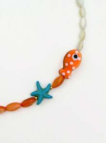 Collar de estilo bohemio con cuentas pintadas a mano con diseño de estrella de mar, cadena de la clavícula de pez payaso de cerámica naranja con lunares