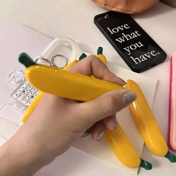 1 pieza Bolígrafo con forma de plátano de diseño creativo, con sistema simulado de presión para una experiencia de escritura suave, adecuado para escribir y dibujar, útiles escolares, artículos de papelería lindos, estilo campus, suministros de oficina