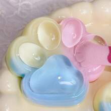 Jouet squishy de grande taille mignon de 6 cm/2,36 pouces en forme de patte de chat. Super doux et compressible, idéal pour le soulagement du stress. Expédié au hasard avec ou sans fourrure.